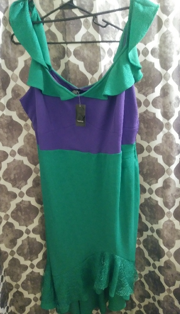 A green and purple costume dress